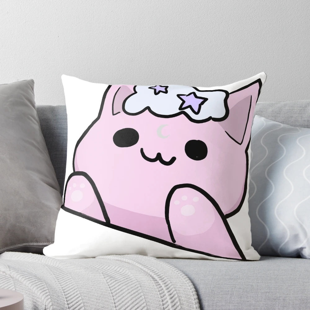 A fluffy white cloud-shaped pillow with a cute pink cat face and crescent moon design.