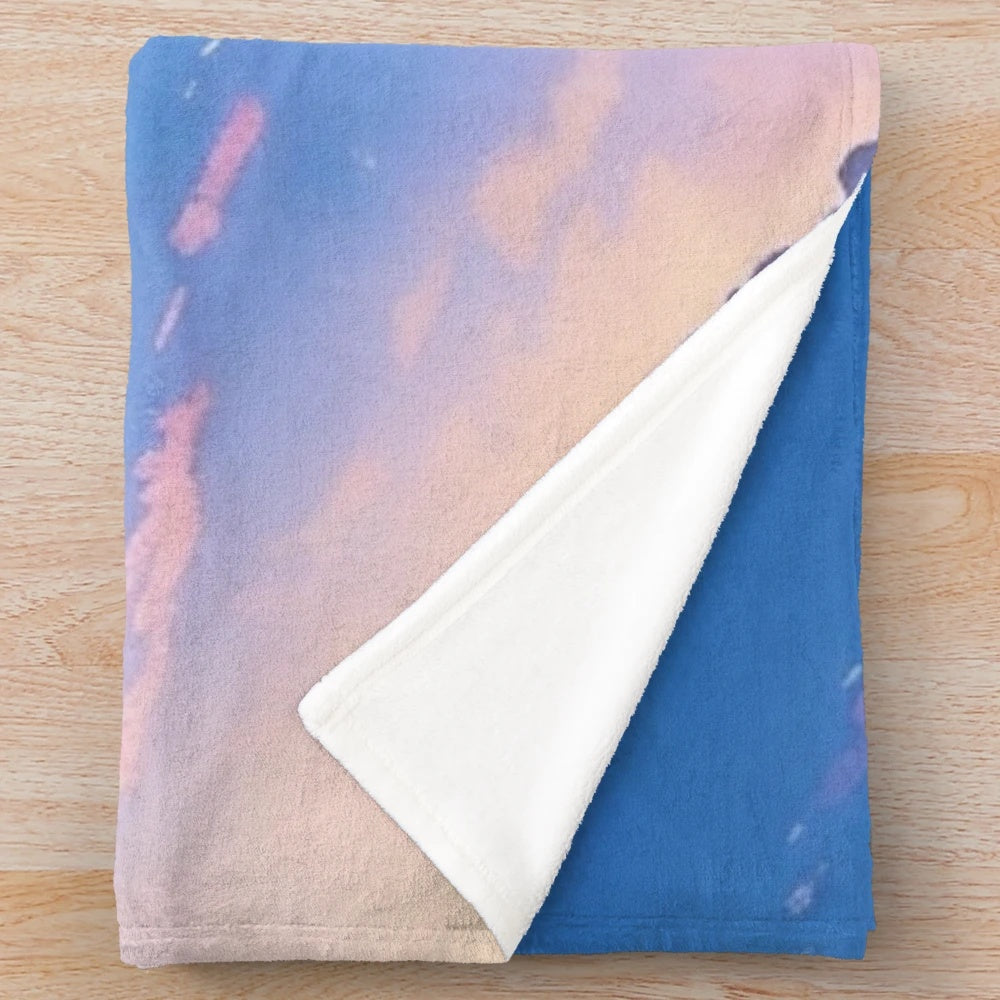 Soft and Plush Blanket with Clouds Design