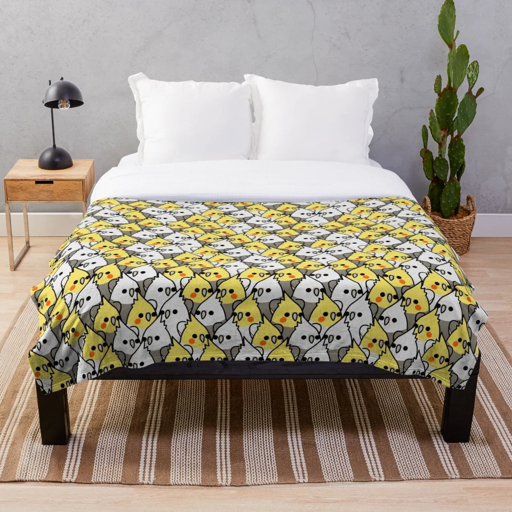 Soft and cuddly plush blanket featuring a group of colorful cockatiels and other birds