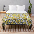 Soft and cuddly plush blanket featuring a group of colorful cockatiels and other birds