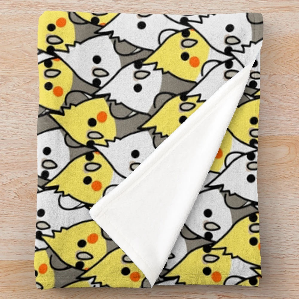 Soft and cuddly plush blanket featuring a group of colorful cockatiels and other birds