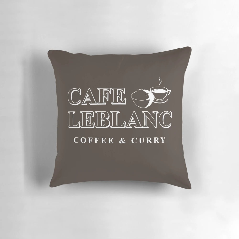A plush pillow featuring the Cafe Leblanc logo from the popular video game Persona 5