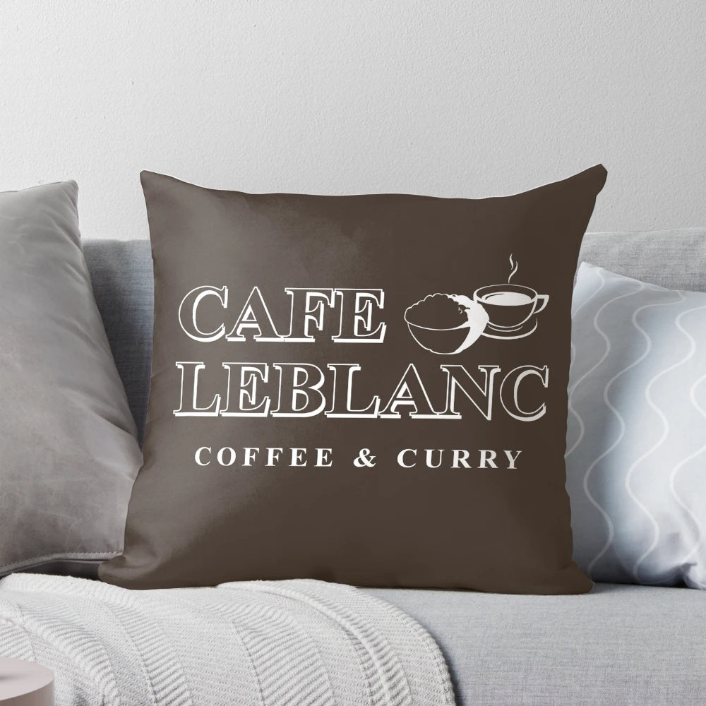 A plush pillow featuring the Cafe Leblanc logo from the popular video game Persona 5