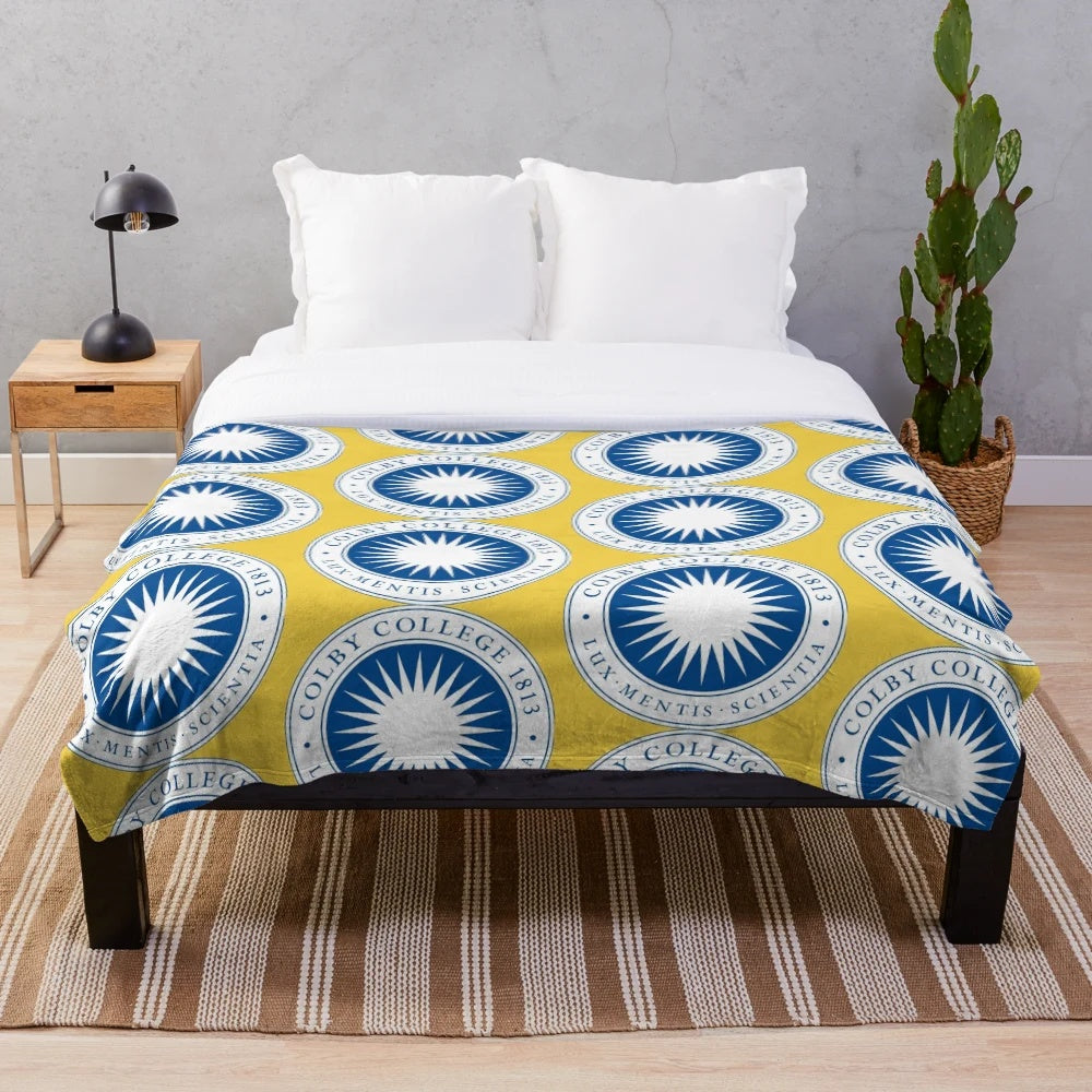 Soft and warm plush blanket featuring the Colby College logo