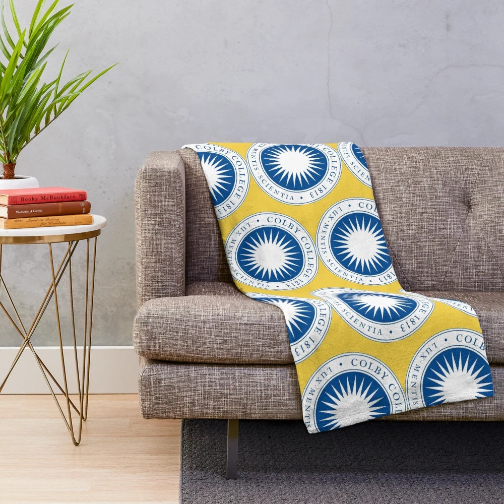 Soft and warm plush blanket featuring the Colby College logo
