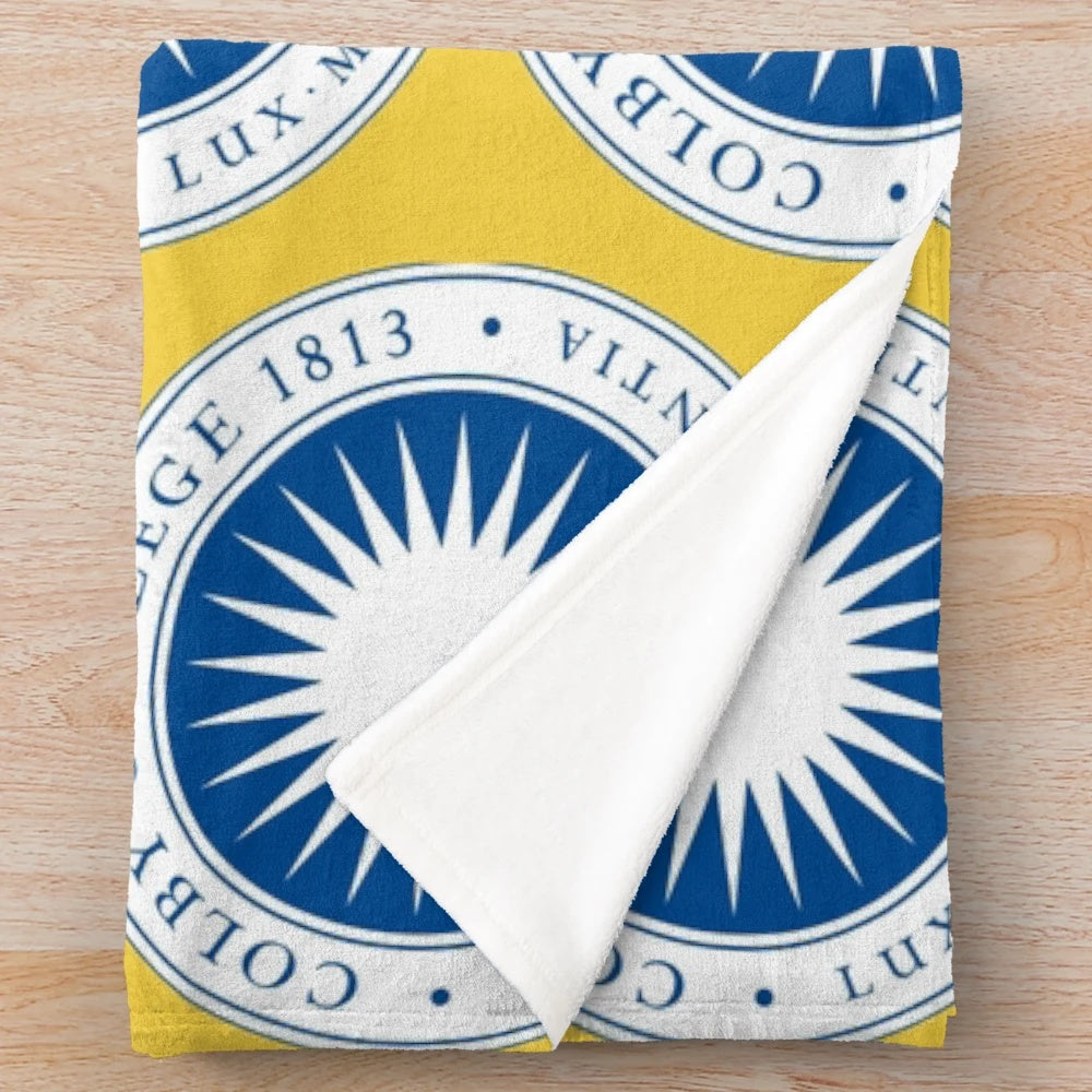 Soft and warm plush blanket featuring the Colby College logo