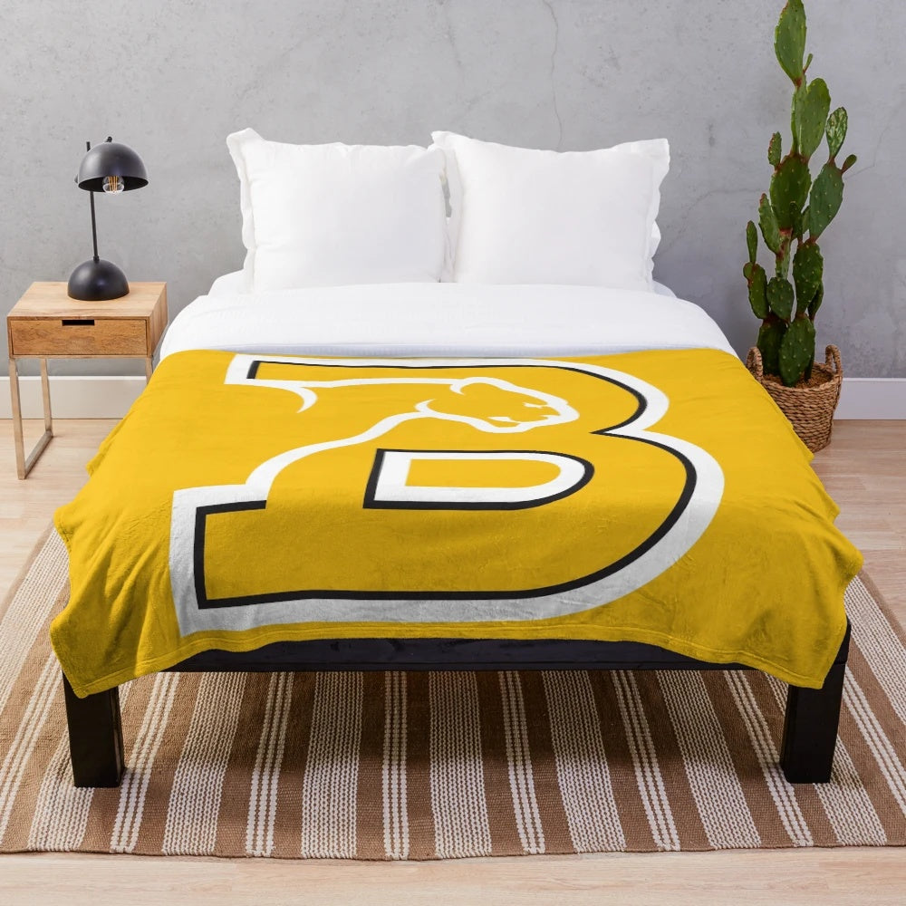 Plush blanket featuring college sports design