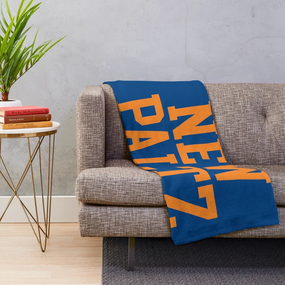 New Paltz college plush blanket with varsity-style curved text design