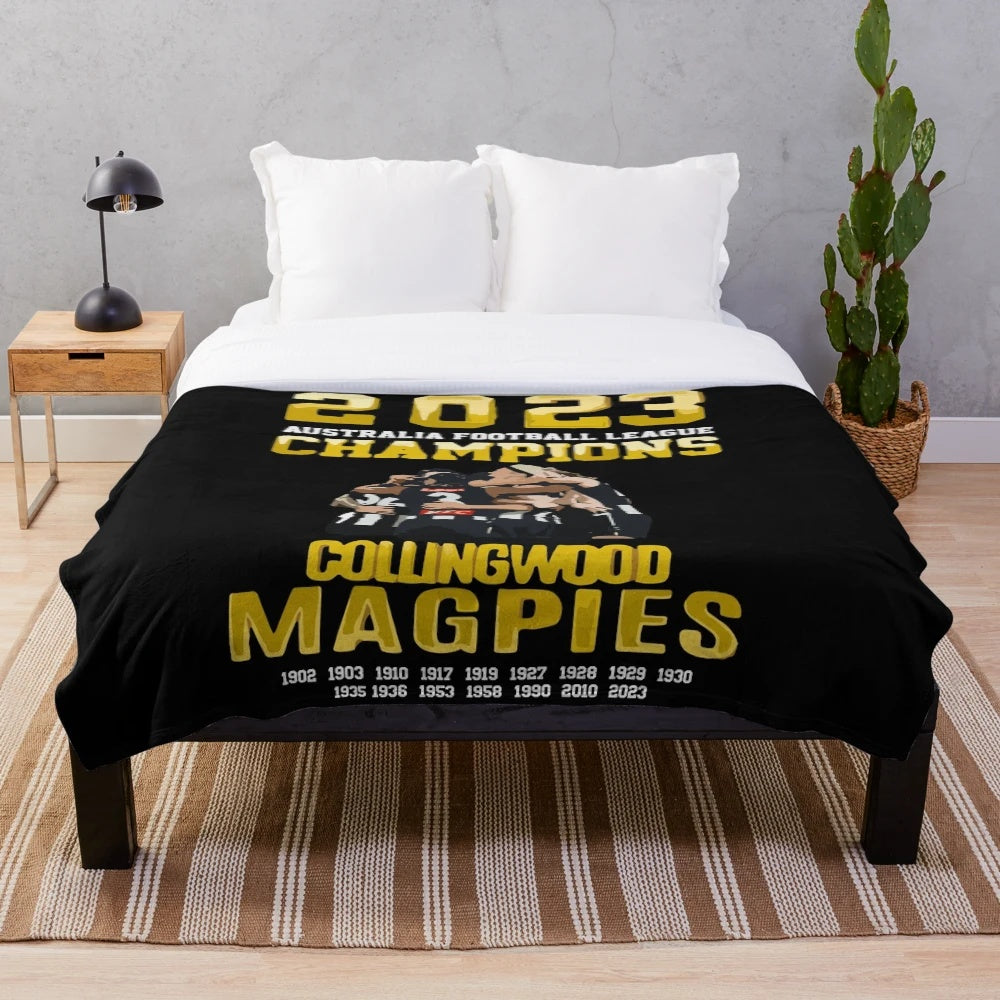 Collingwood-inspired plush blanket with AFL team colors and logo
