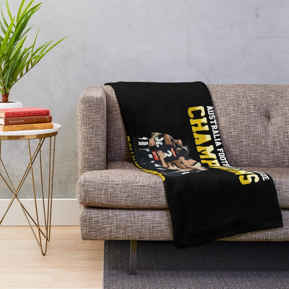 Collingwood-inspired plush blanket with AFL team colors and logo