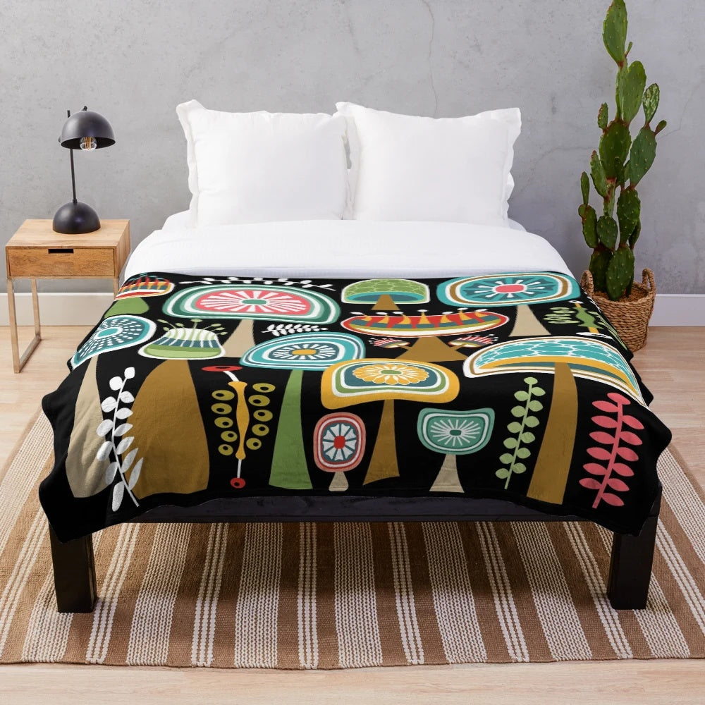 Colorful mid century modern style plush blanket with abstract mushroom design