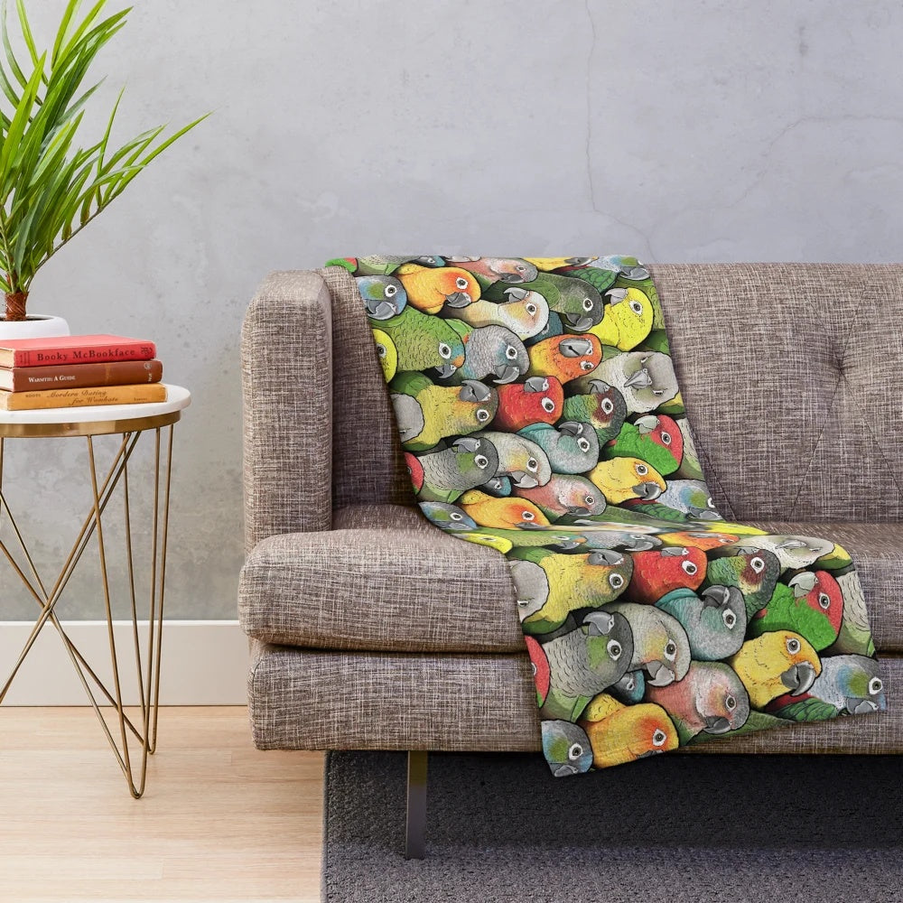 Colorful plush blanket featuring a vibrant conure bird pattern