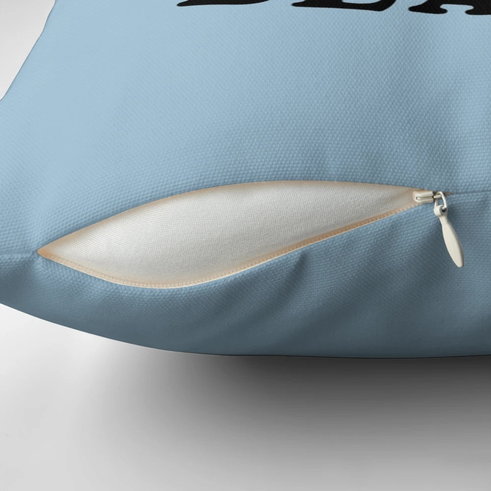 A soft, cozy pillow with the text "Cool Beans" printed on it, perfect for adding a touch of humor to your home decor.