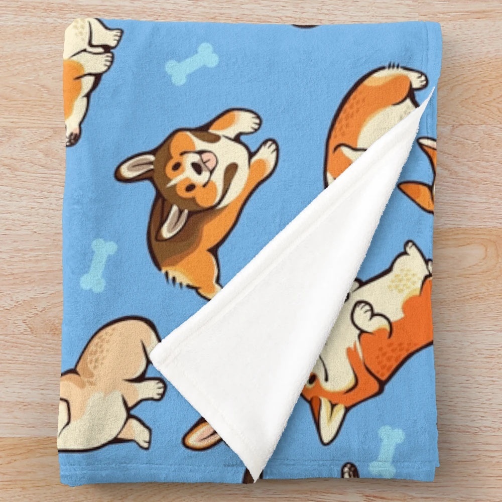 Blue plush blanket featuring a cute corgi dog pattern
