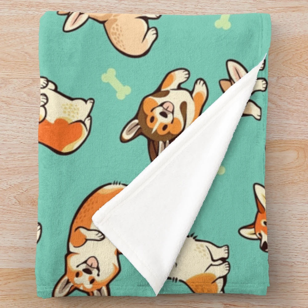 A plush blanket featuring a design of cute corgis in a green pattern