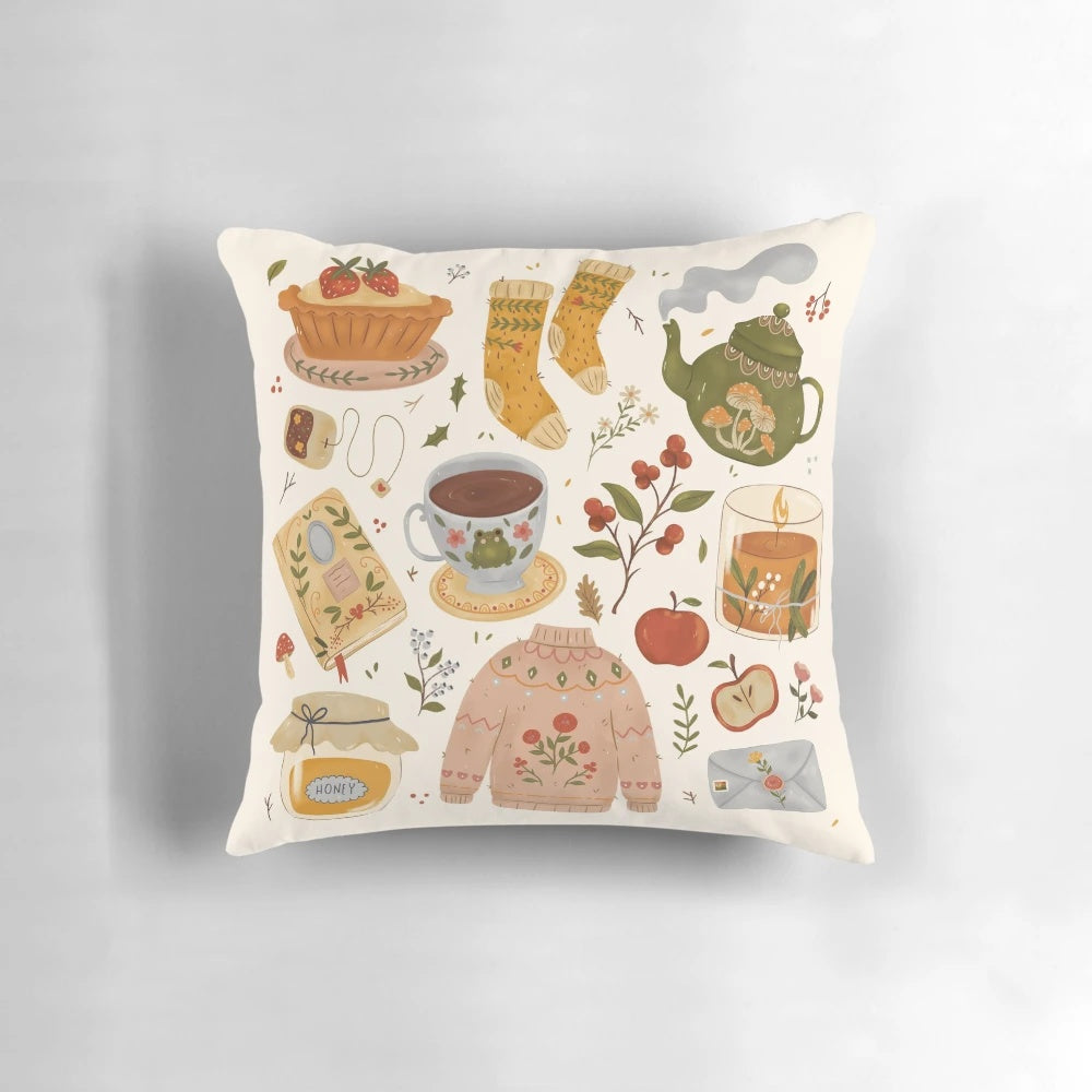 Cozy cottage-style throw pillow with floral and tea pot design for winter home decor