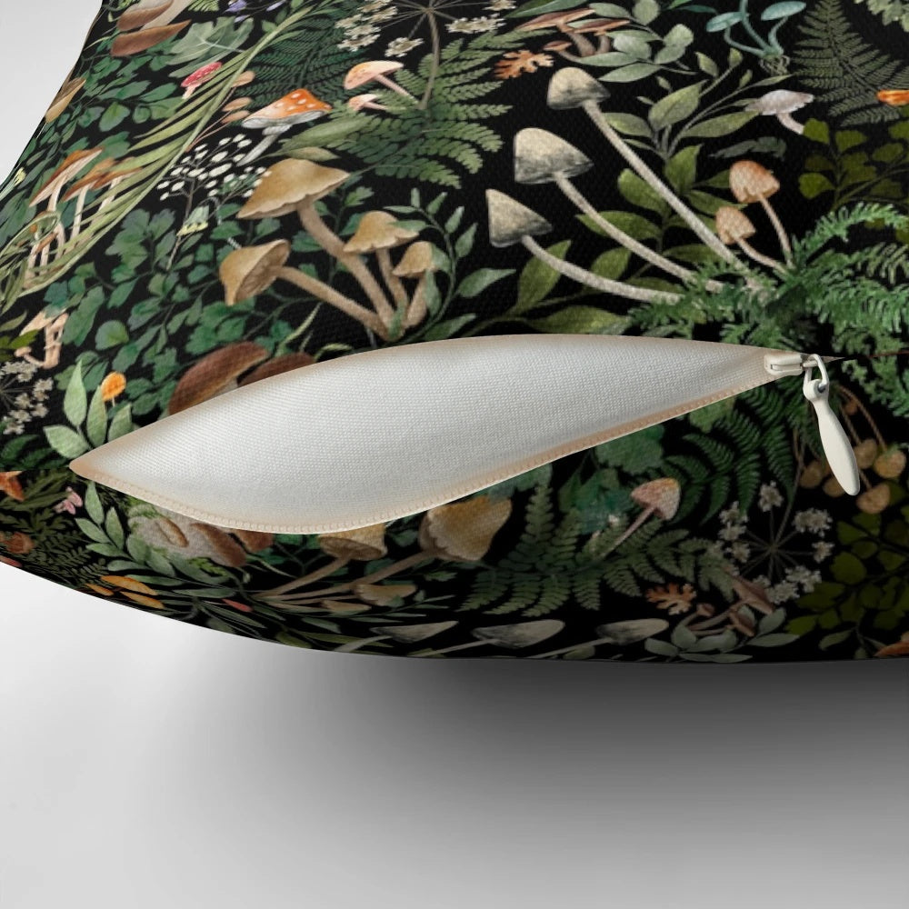 A soft, plush pillow featuring a whimsical forest forager design with mushrooms and nature motifs.