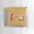 A decorative pillow featuring the popular couple John and Catana from the comics, surrounded by lush, green plants.