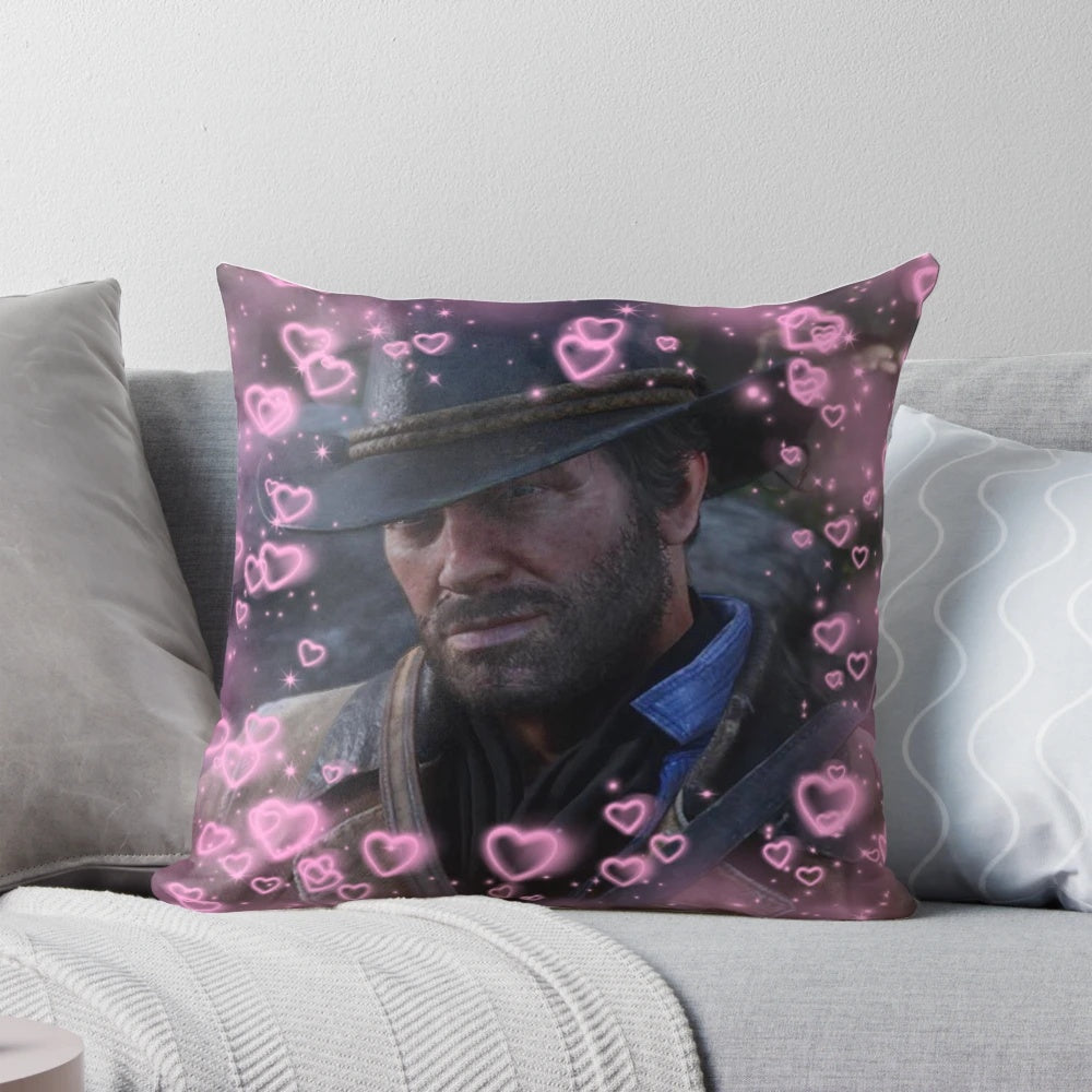 A plush, heart-shaped pillow featuring the character Arthur Morgan from the Red Dead Redemption video game series.