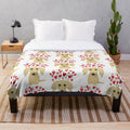 Soft and cuddly cream-colored long-haired dachshund plush blanket with heart pattern