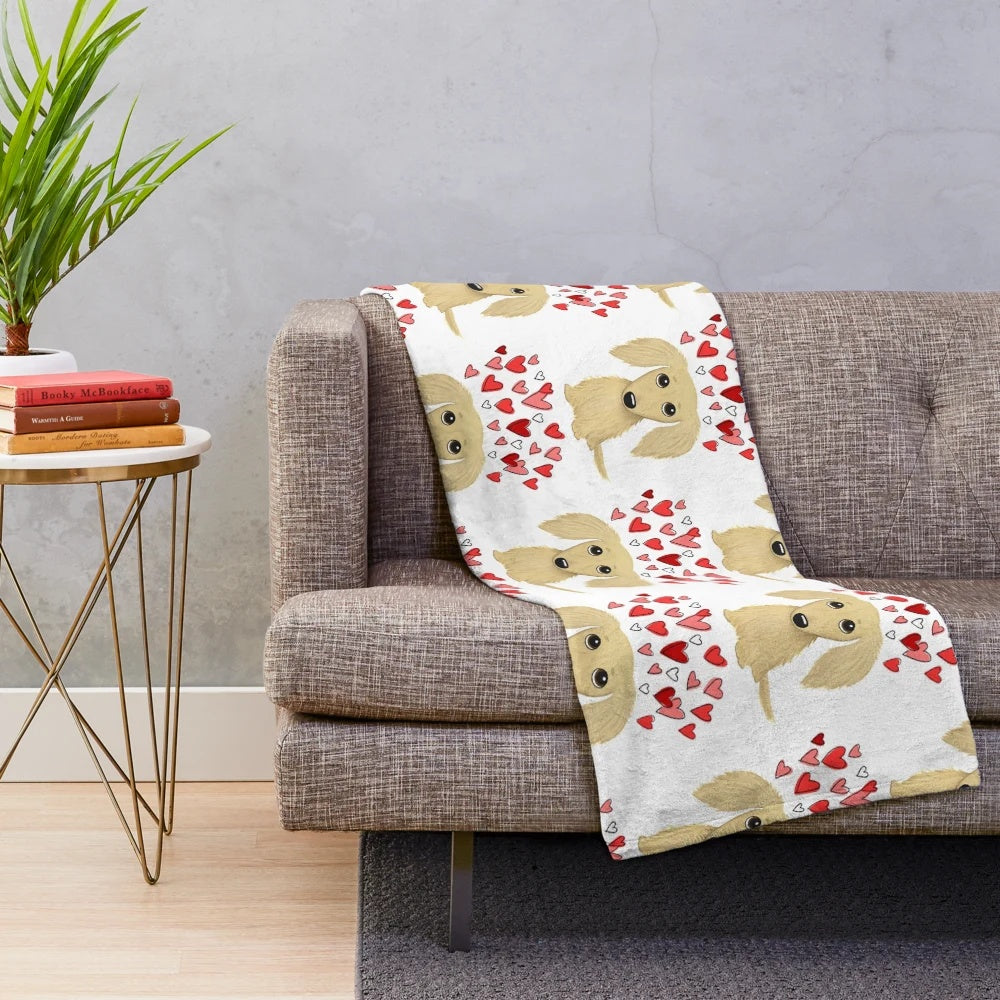Soft and cuddly cream-colored long-haired dachshund plush blanket with heart pattern