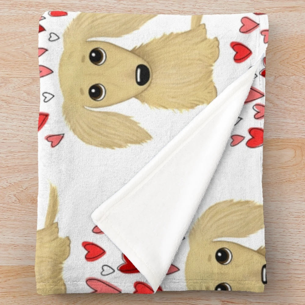 Soft and cuddly cream-colored long-haired dachshund plush blanket with heart pattern