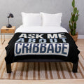 Plush blanket with cribbage-inspired design and text