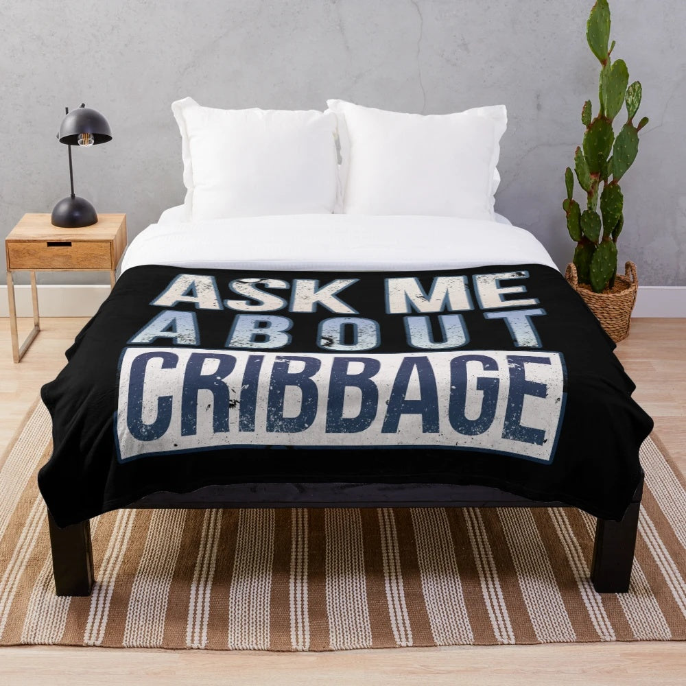 Plush blanket with cribbage-inspired design and text