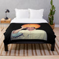 Plush blanket with pumpkin design, inspired by crime TV show