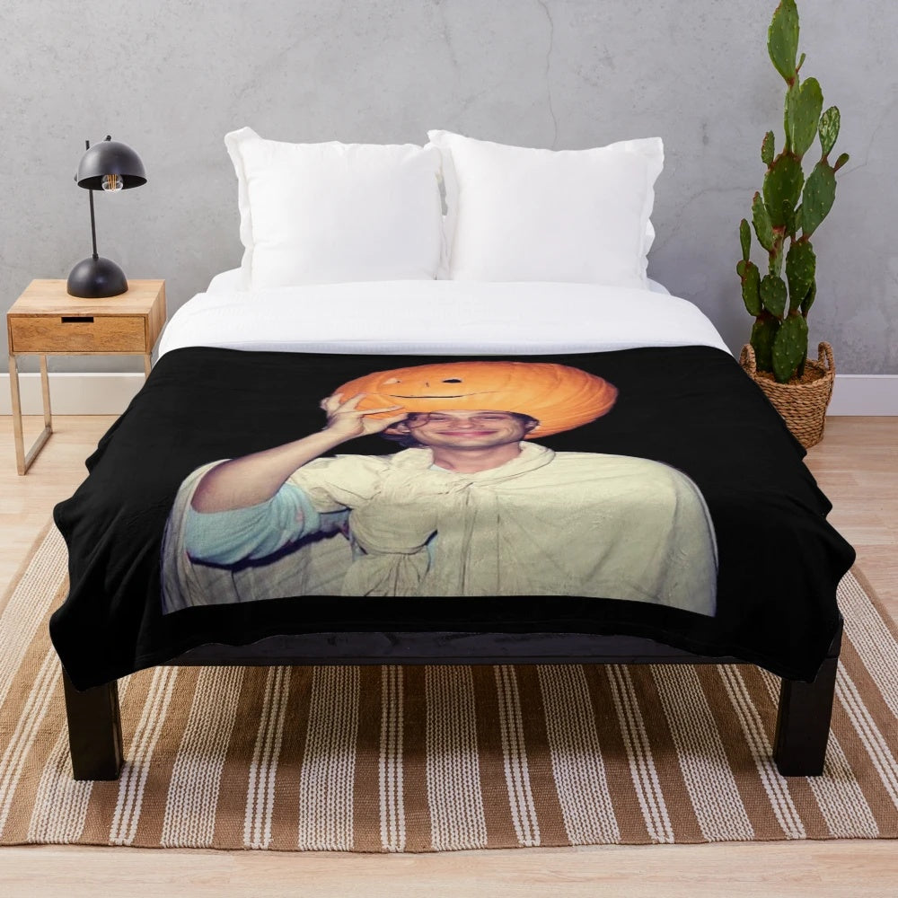 Plush blanket with pumpkin design, inspired by crime TV show