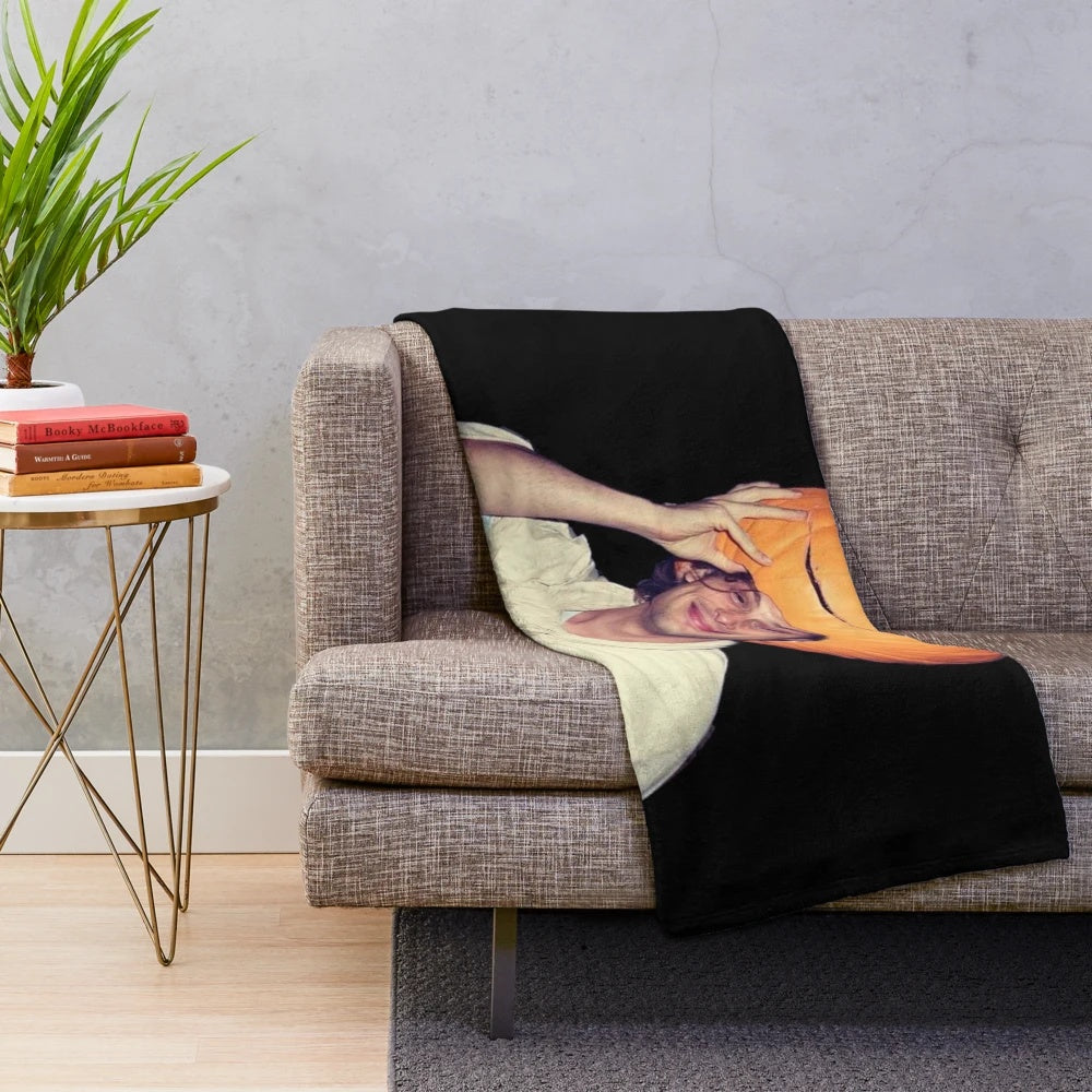 Plush blanket with pumpkin design, inspired by crime TV show