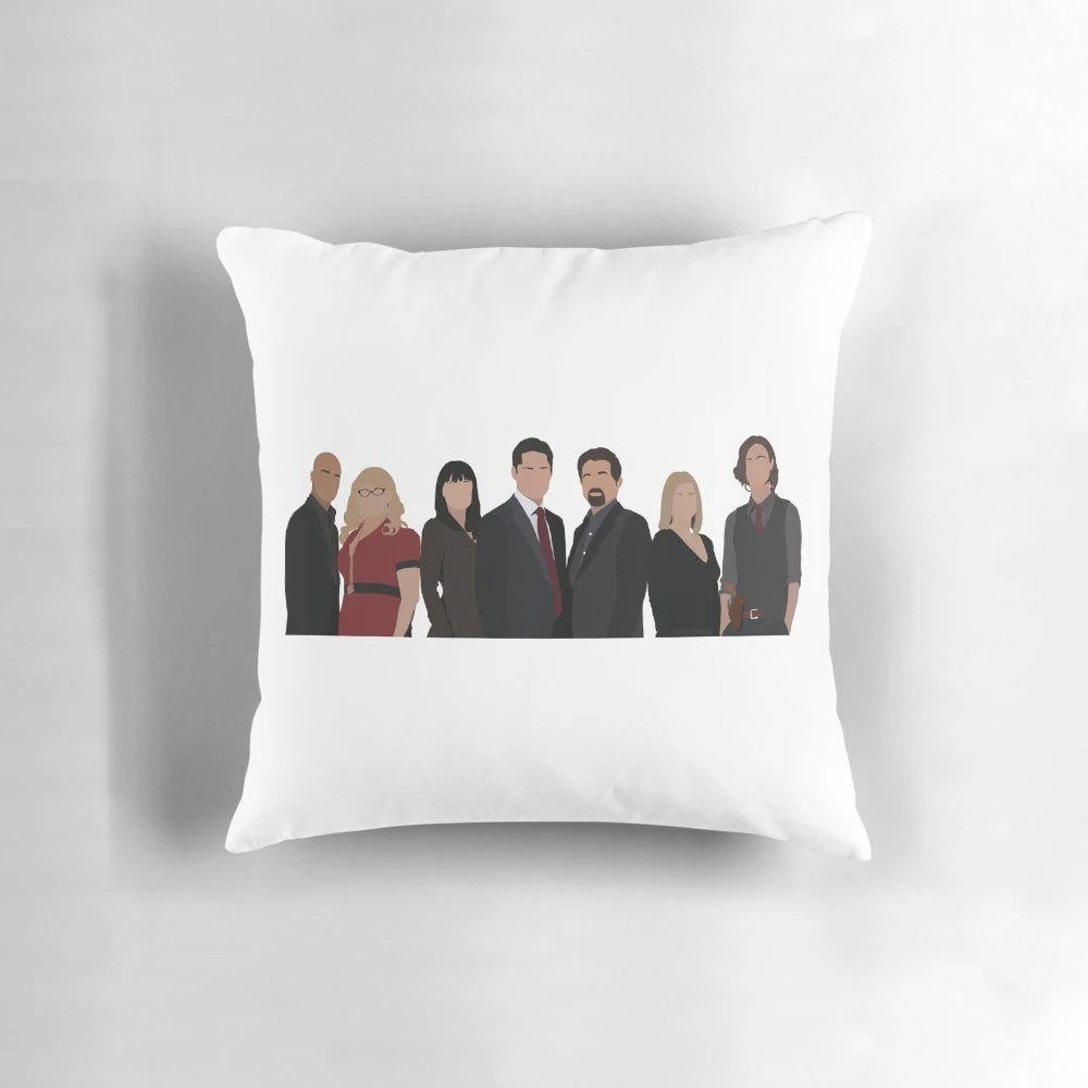 A plush, cozy pillow featuring the main characters from the TV show Criminal Minds.
