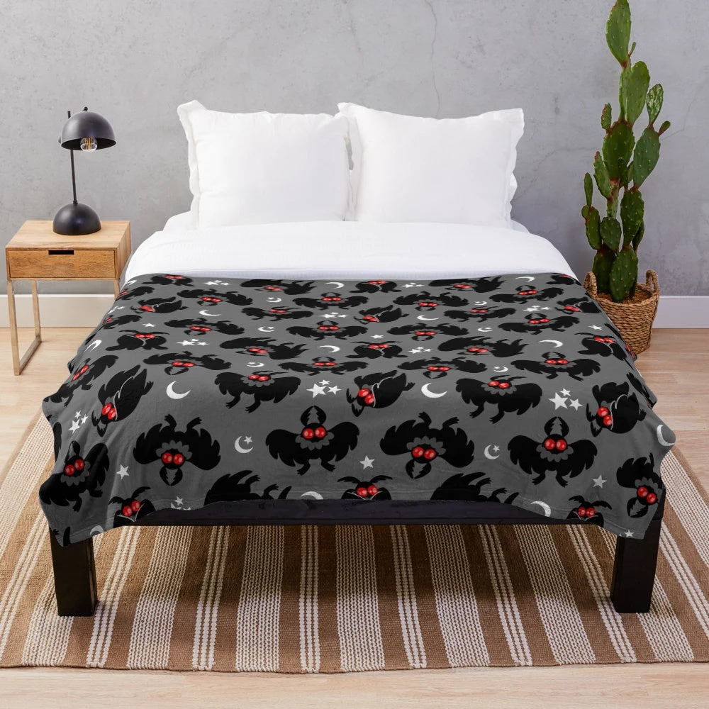 Mothman pattern plush blanket, featuring a cozy cryptid design