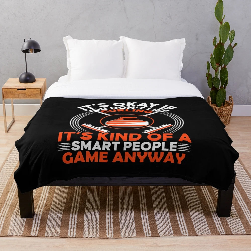 Curling blanket with curling stone design for winter sports fans