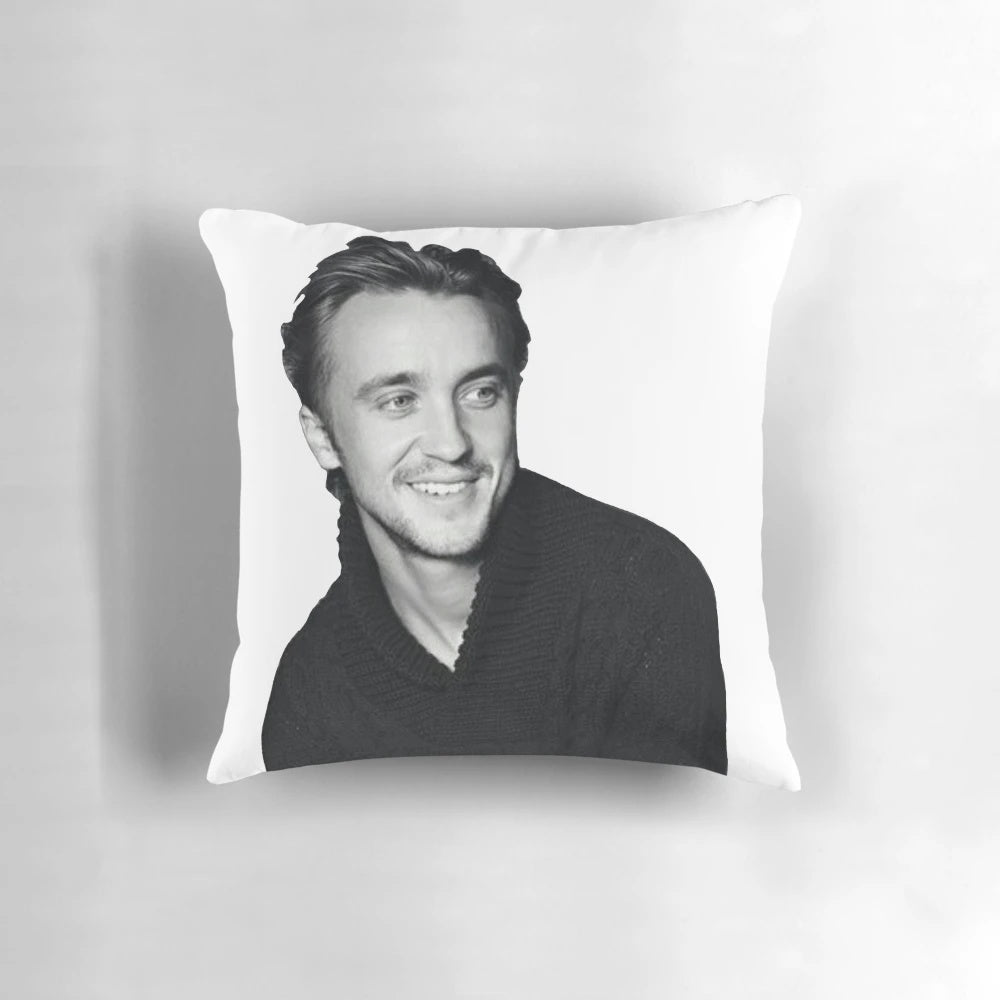 Cozy custom pillow featuring an image of actor Tom Felton, known for his role as Draco Malfoy in the Harry Potter series.