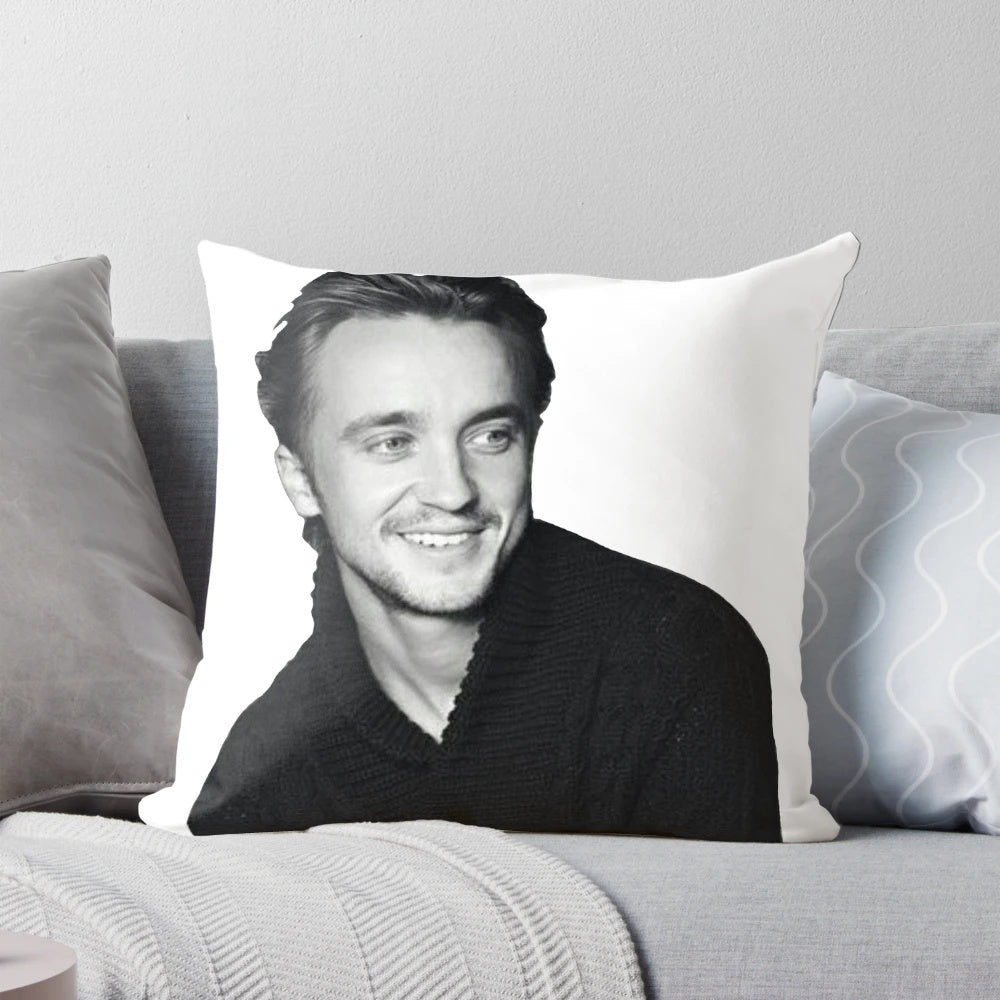 Cozy custom pillow featuring an image of actor Tom Felton, known for his role as Draco Malfoy in the Harry Potter series.