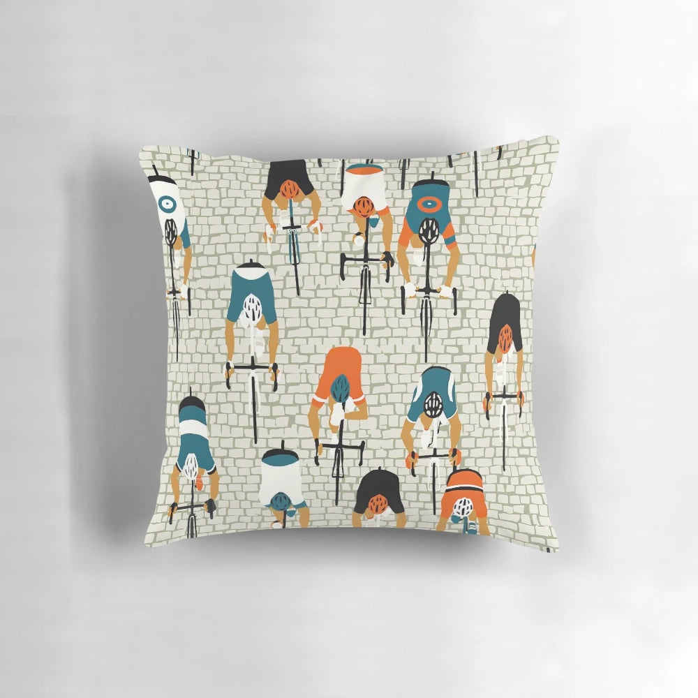 Colorful cycling-themed throw pillow with tile road pattern