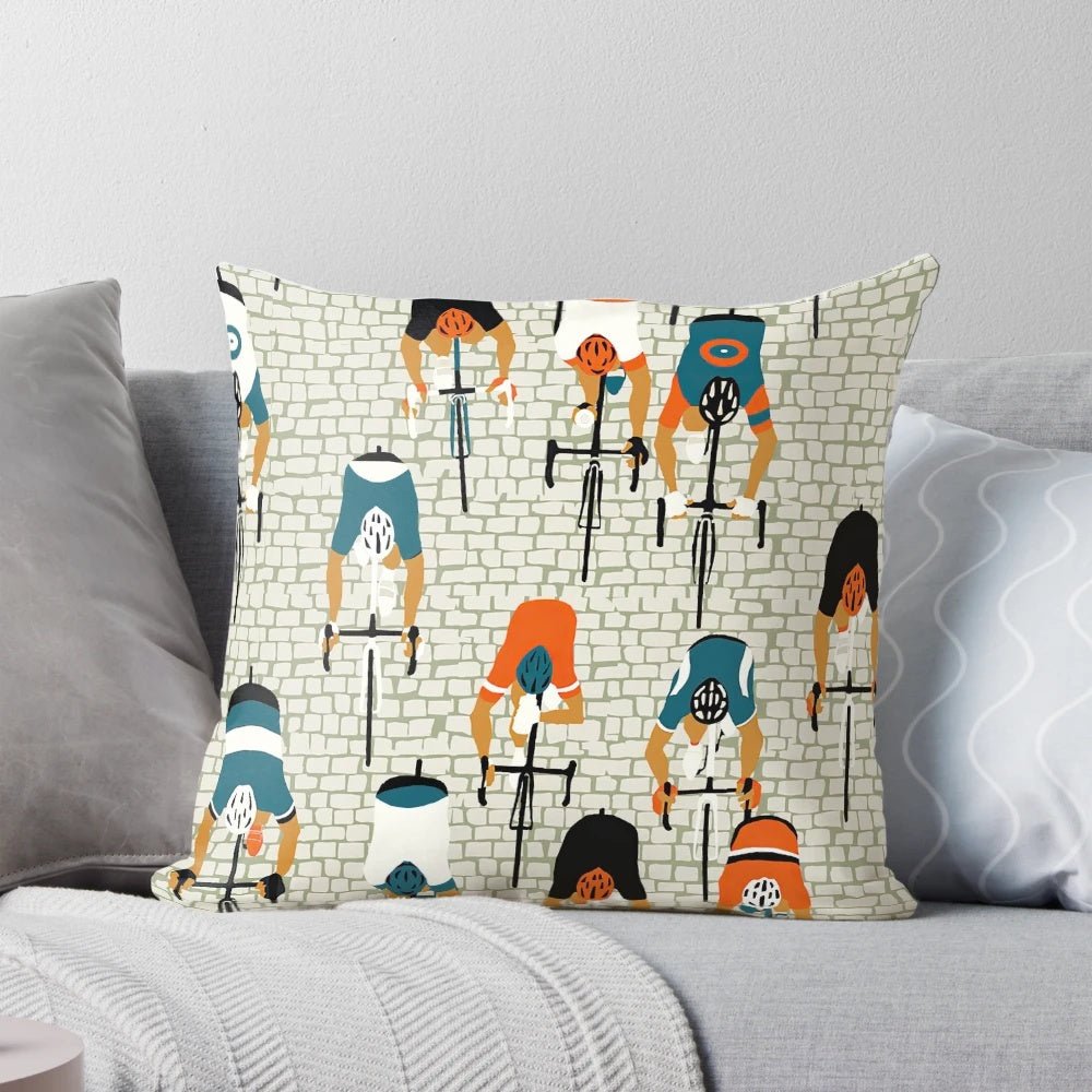 Colorful cycling-themed throw pillow with tile road pattern