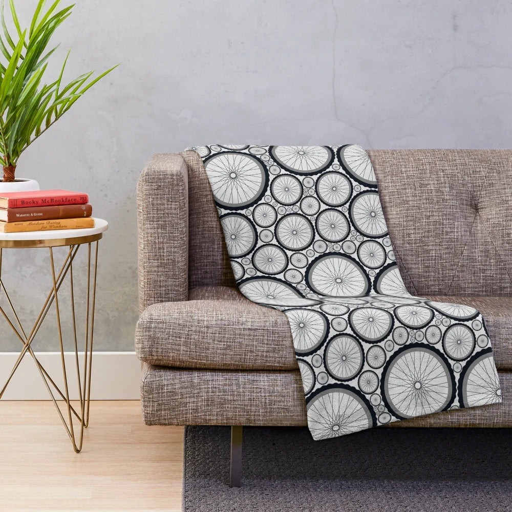 Cycling-themed plush blanket