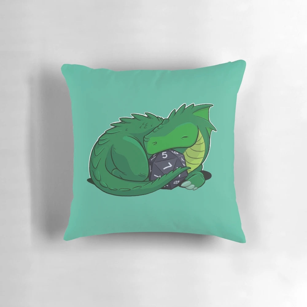 Soft, plush green dragon pillow with a d20 dice pattern, perfect for DnD enthusiasts.