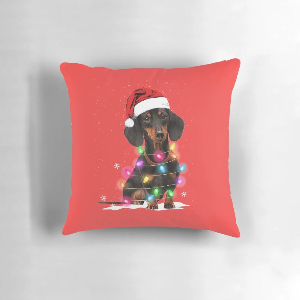 Festive dachshund-themed pillow with Christmas lights, a snow-inspired sweater design, and a soft, plush texture.