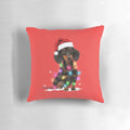 Festive dachshund-themed pillow with Christmas lights, a snow-inspired sweater design, and a soft, plush texture.