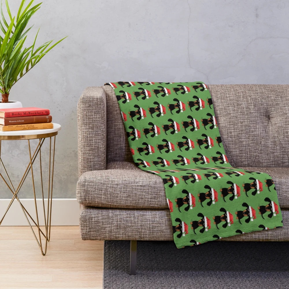 Dachshund plush blanket with santa hat and holiday design
