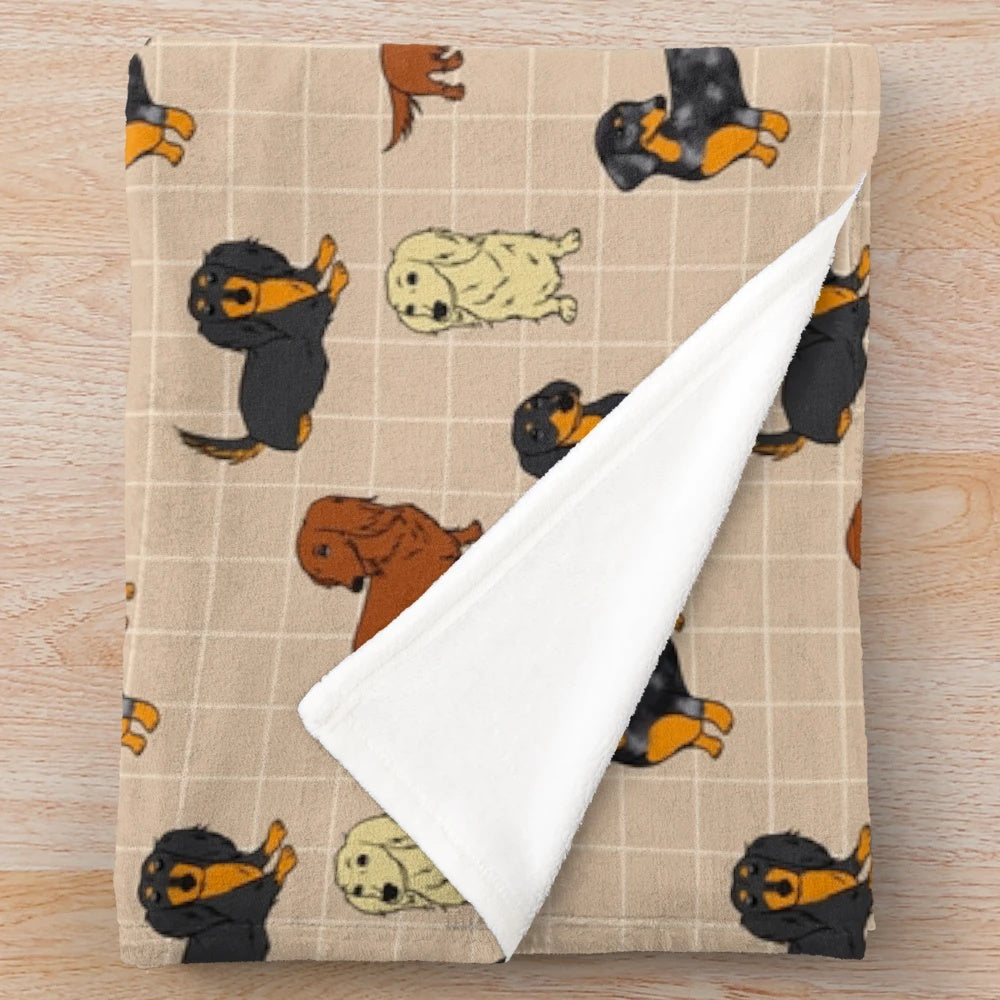 Cream colored plush blanket with a dachshund dog design