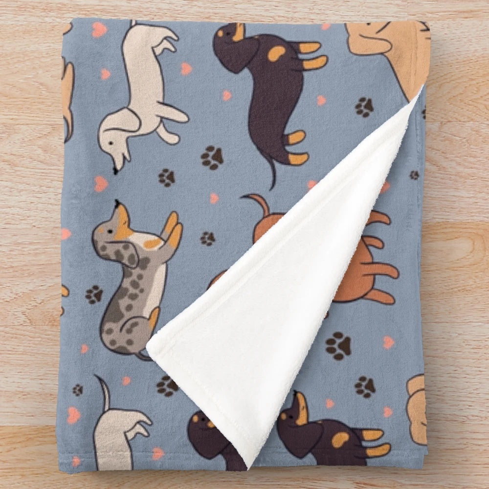 Dachshund plush blanket with a cute cartoon dachshund dog pack illustration pattern