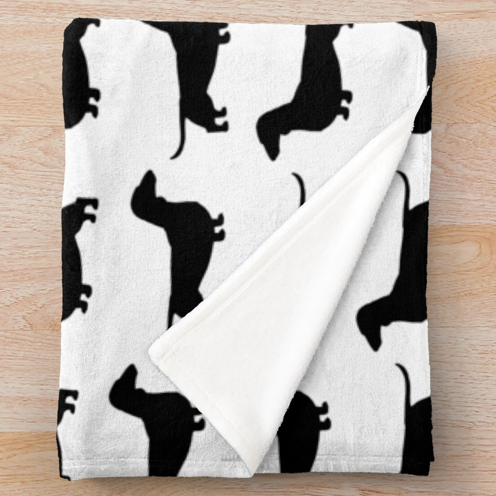 Dachshund dog silhouette design on a soft, smooth coated plush blanket