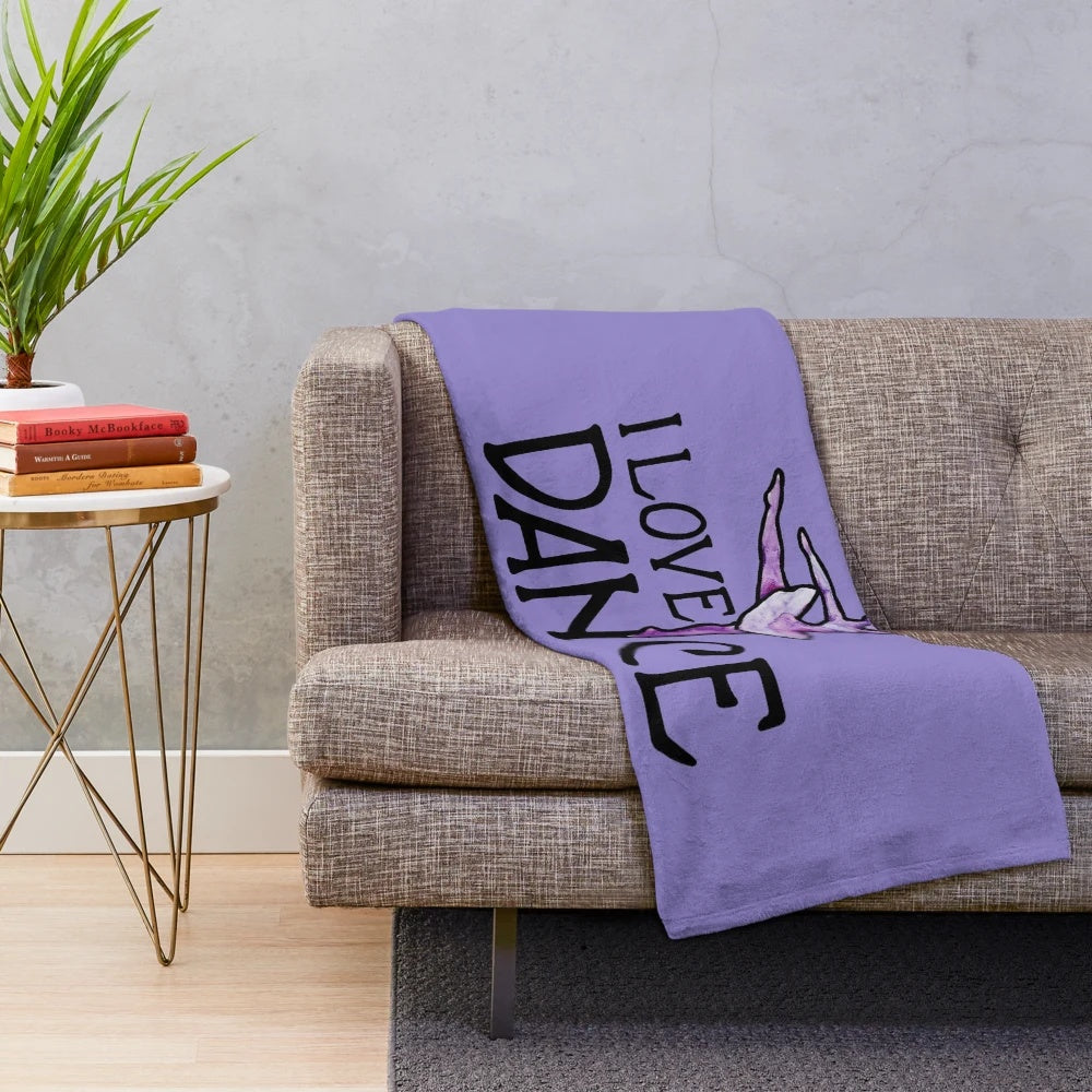 Plush dance-themed blanket with a ballerina silhouette