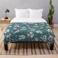Dark blue plush blanket with reptile pattern design