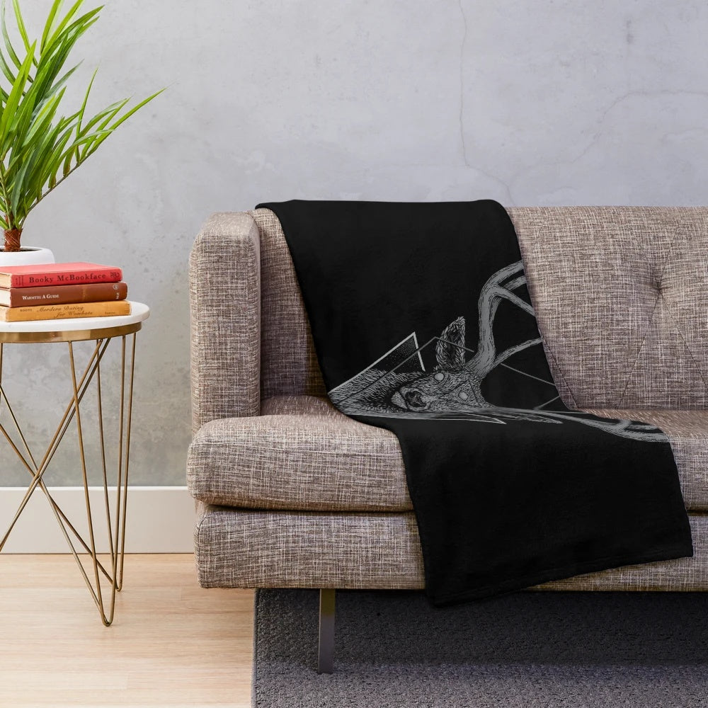 Dark deer plush blanket with geometric patterns