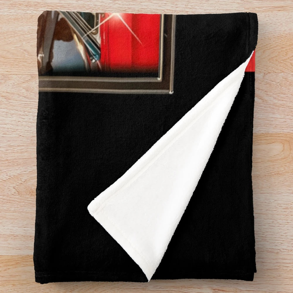 Dark green plush blanket with Jonas Brothers design